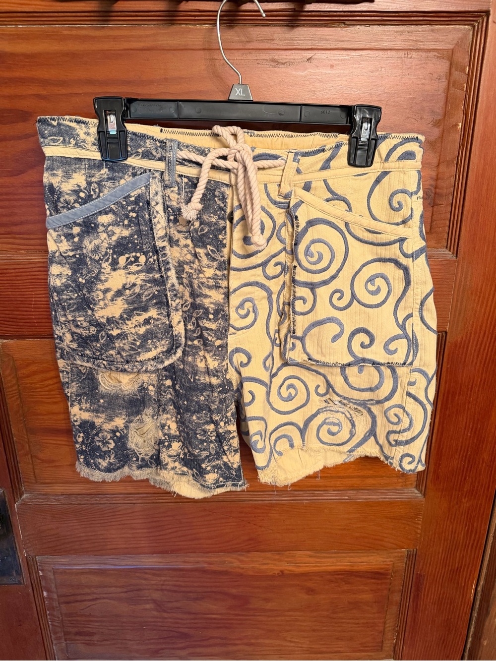 FREE PEOPLE Cream Colored
Distressed Shorts with Blue Swirls